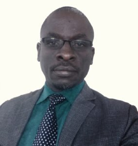 Picture of Dr. Peter Mukobi, Senior Executive Consultant.  Affiliation: Gulu Regional Referral Hospital (listed for transparency)